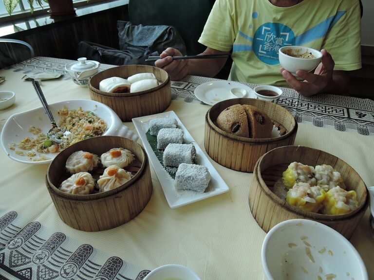 A table of Cantonese dim sum dishes