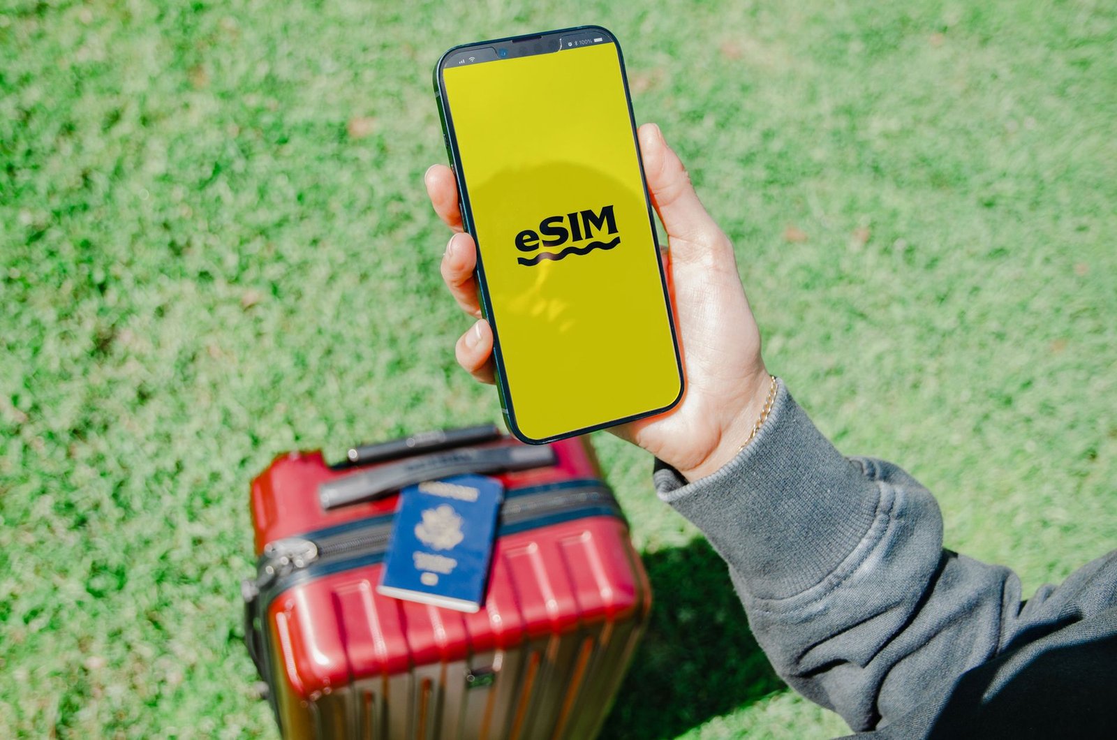 Traveler buying a SIM card at a mobile phone counter.