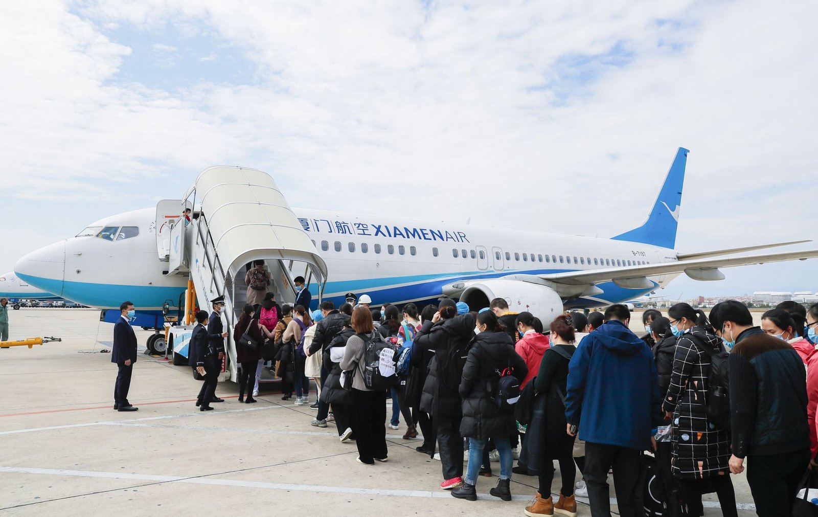 Civilian travelers arriving between Russia and China.