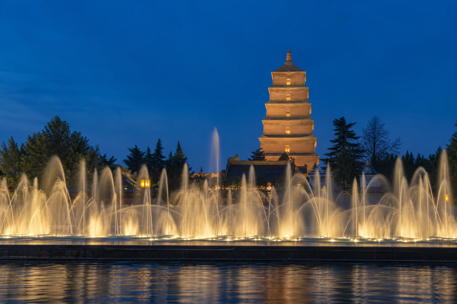 Evening fountain show near the Giant Wild Goose Pagoda.