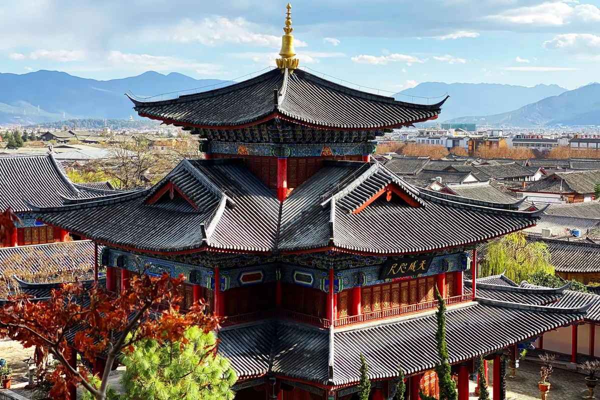 Traditional pavilion and mountain view in Lijiang