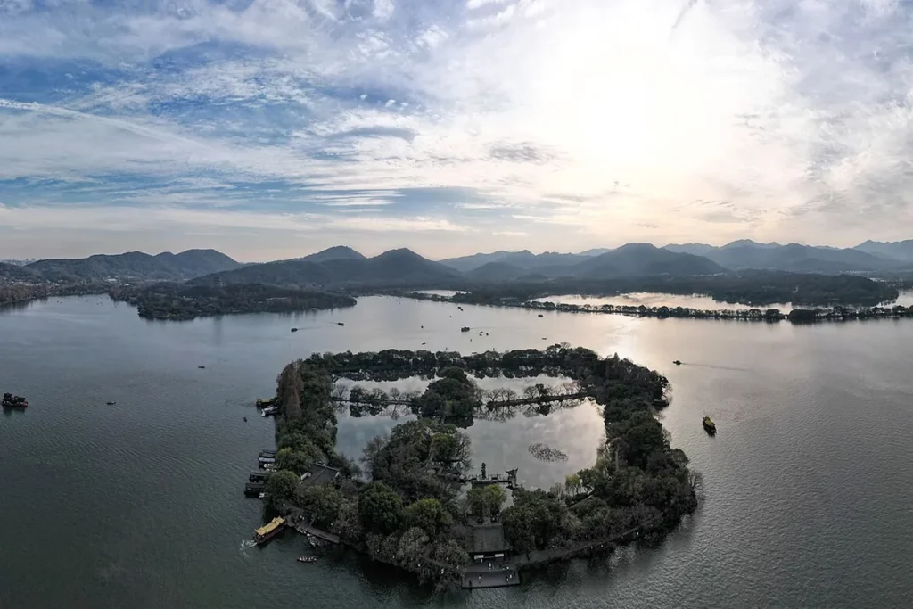 Aerial panorama of West Lake and surrounding mountains in Hangzhou