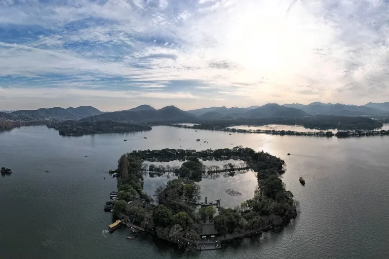 Aerial panorama of West Lake and surrounding mountains in Hangzhou