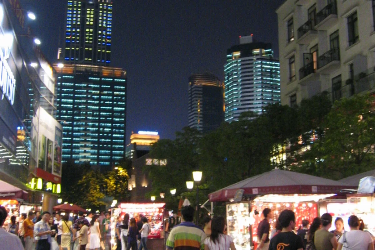 Visitors in the illuminated pedestrian lanes of Shanghai Xintiandi