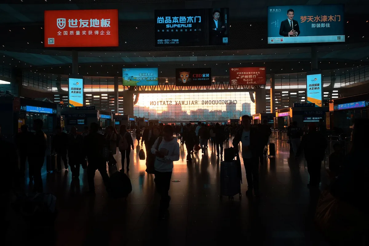 Passengers inside Chengdu East Railway Station during a holiday travel rush