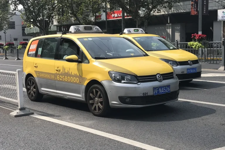 Licensed city taxis waiting on a Shanghai street