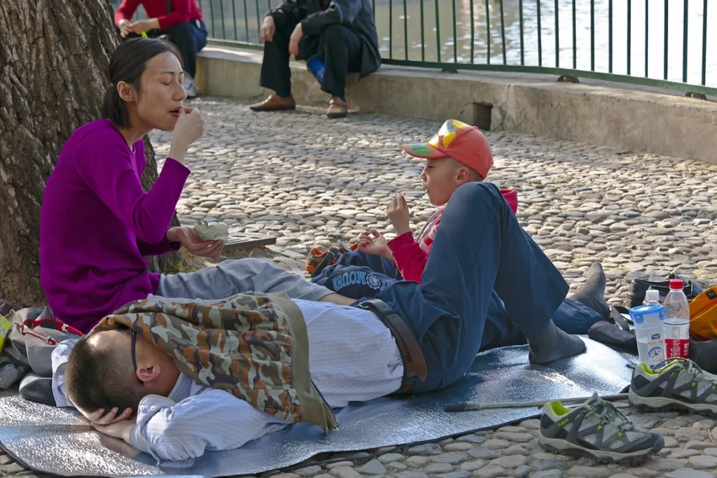 Family with a child walking in Beihai Park Beijing