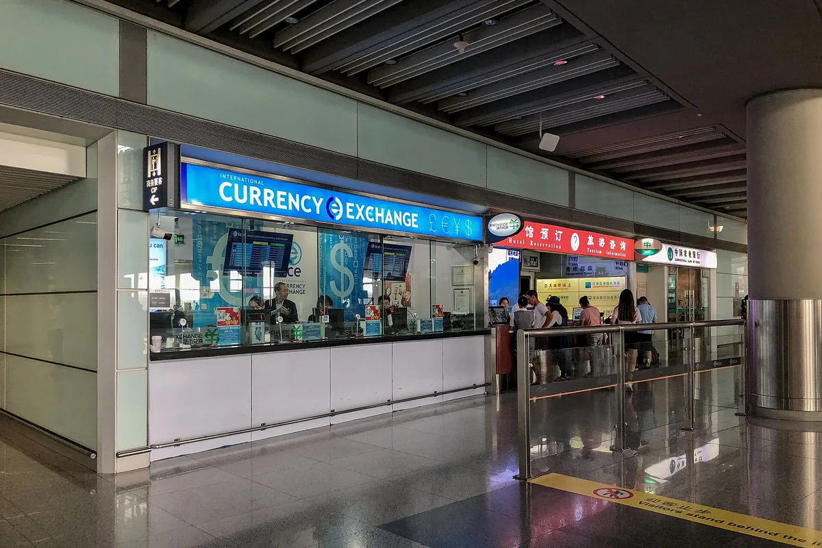 Currency exchange counters at Beijing airport international arrivals