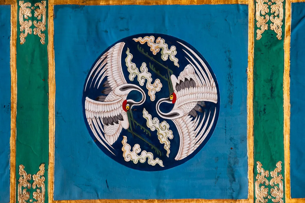 Crane embroidery panel inside the Forbidden City in Beijing