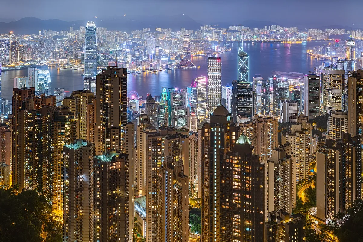 50 mpix panorama of Hong Kong's harbour and skyline, as seen from Victoria Peak on a rainy night of June 2019.