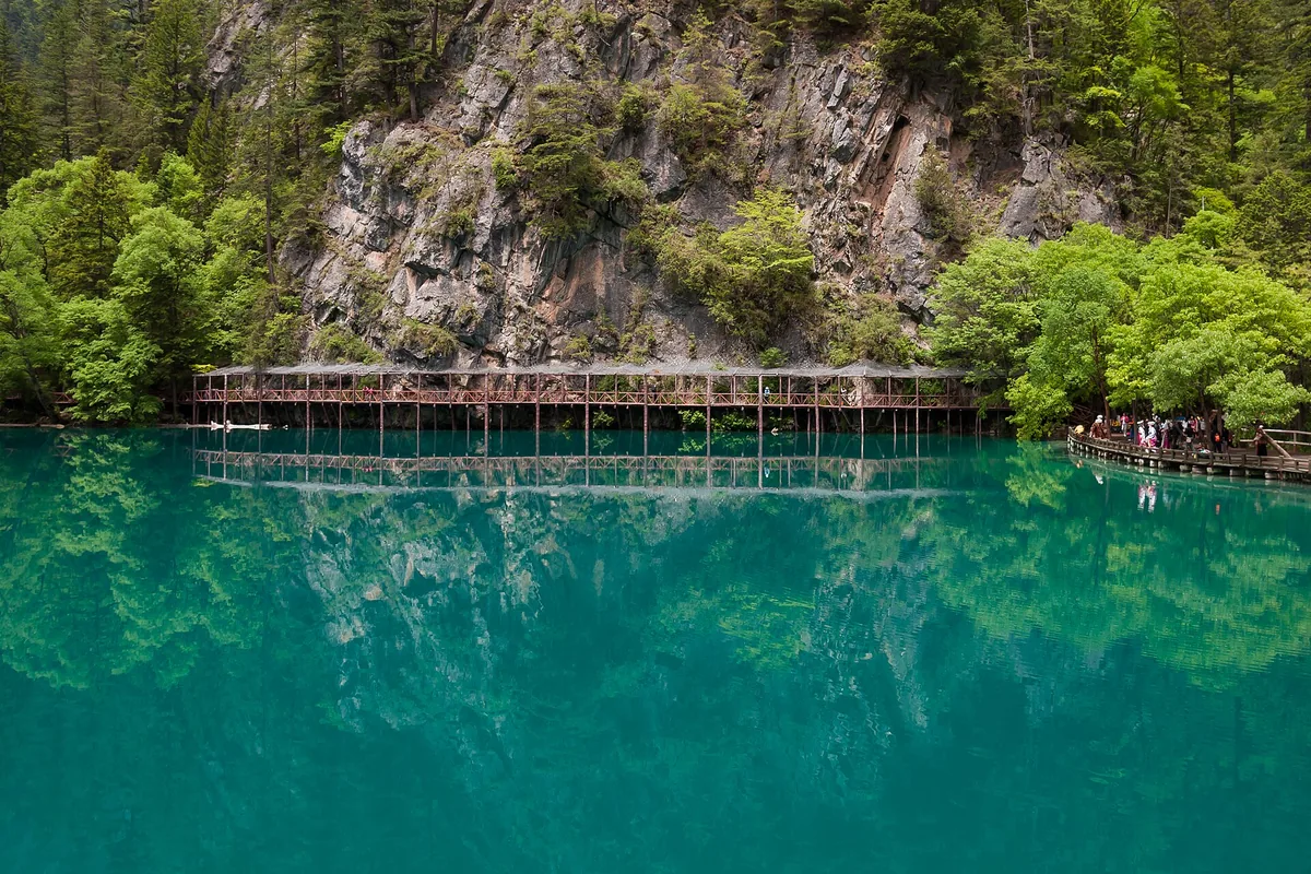 Panda Lake boardwalk and turquoise water in Jiuzhaigou