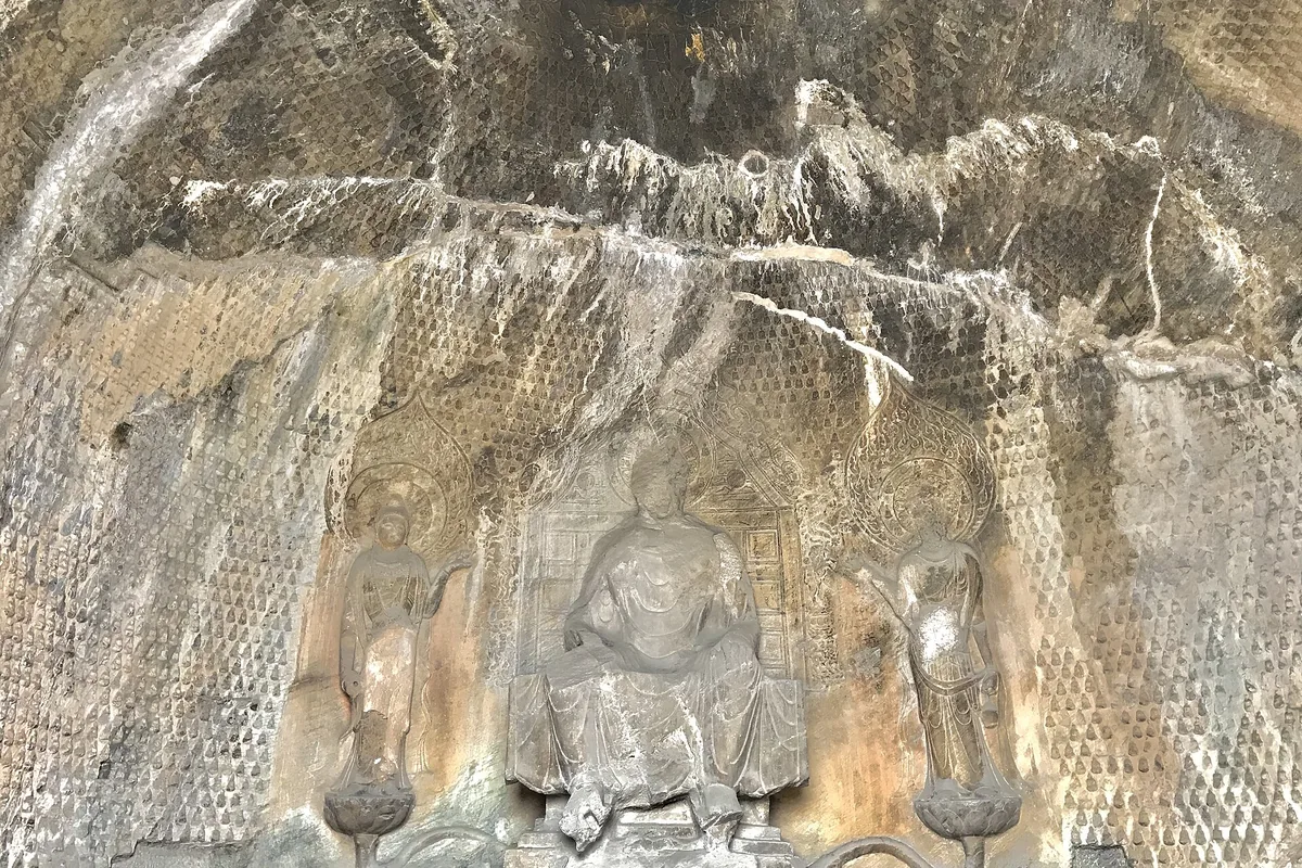 Buddhist reliefs carved into the limestone cliff at Longmen
