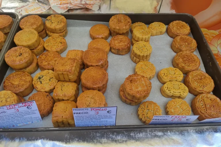 Assorted mooncakes displayed for a Mid-Autumn Festival event