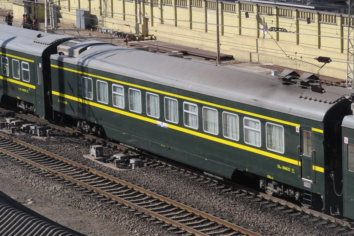 Conventional Chinese passenger train with sleeper carriages