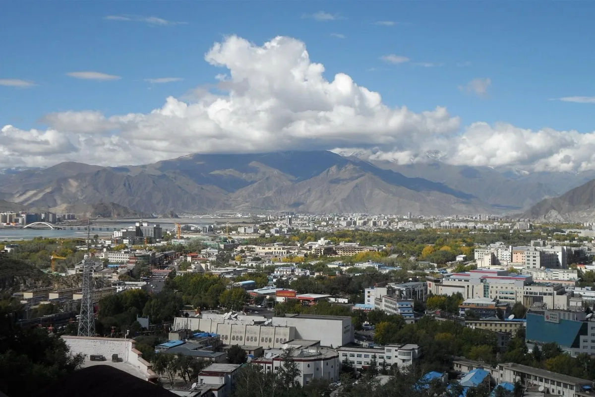 Panoramic view over Lhasa and surrounding mountains from Potala Palace