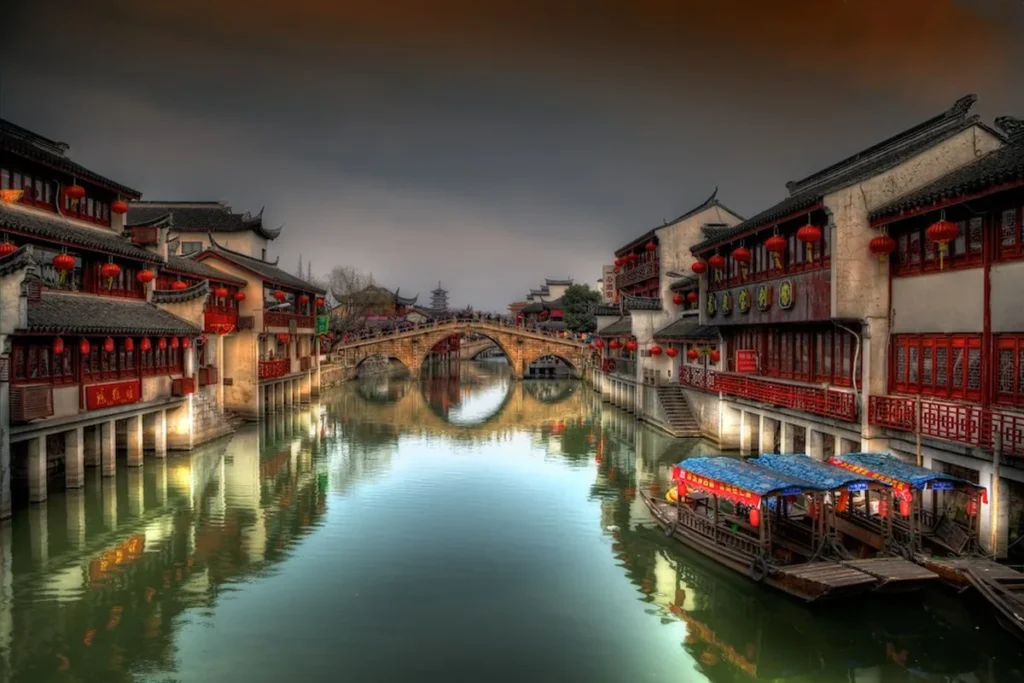 Canal, arched bridge and traditional buildings in Qibao Ancient Town