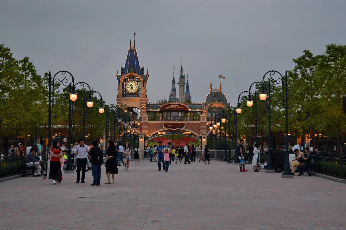 Main entry avenue at Shanghai Disneyland with visitors