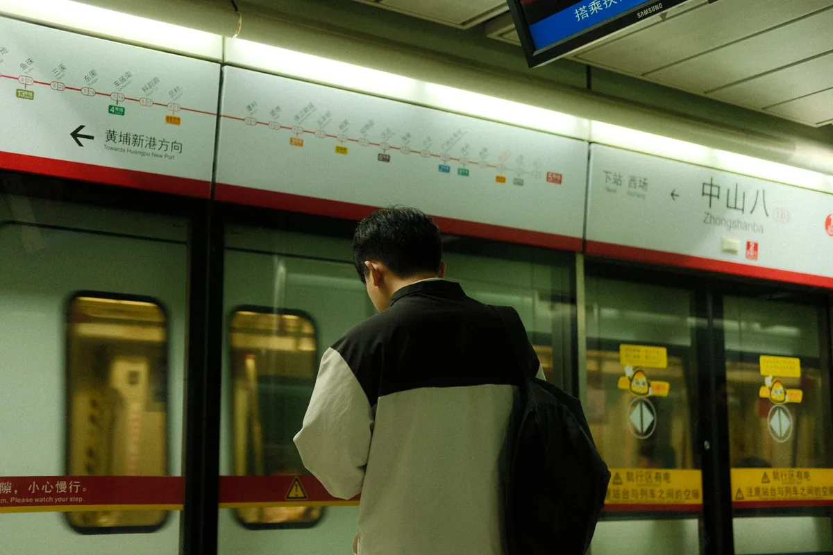 Passenger waiting at Zhongshanba metro station in Chongqing