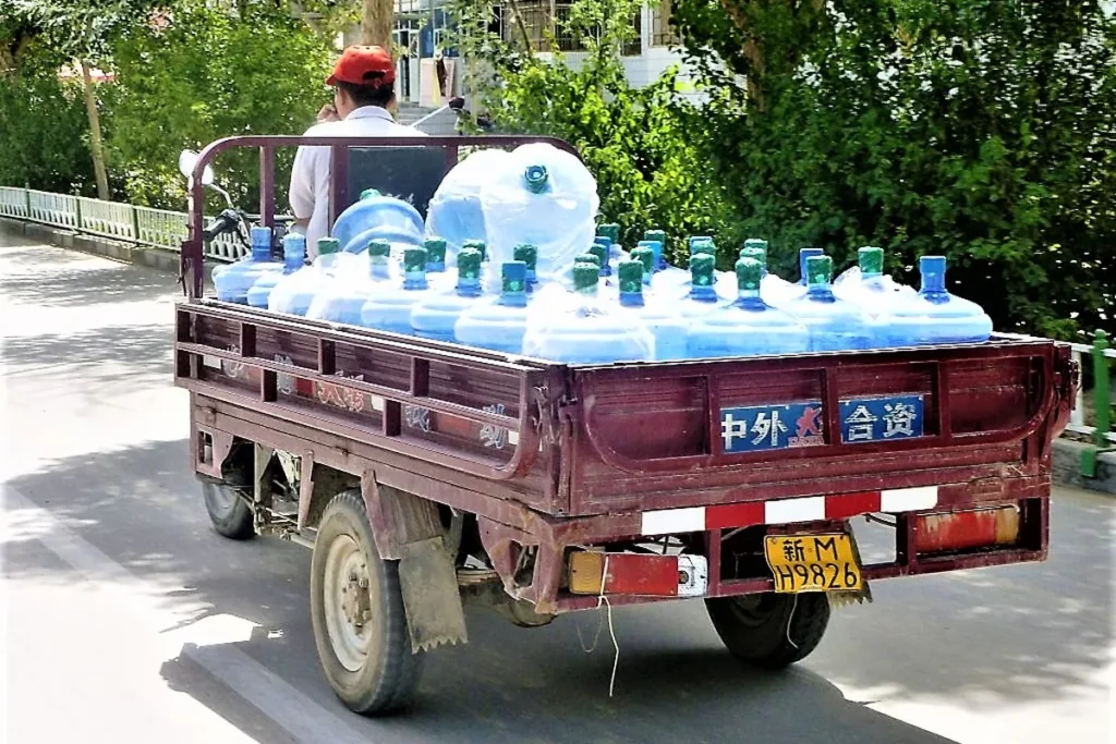 Bottled drinking water being delivered by cart in Xinjiang, China