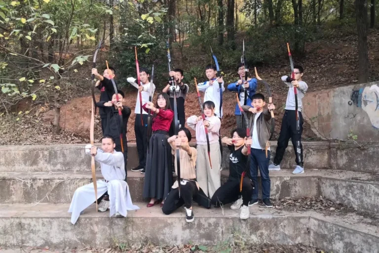 Members of a Hanfu club wearing period-inspired clothing for archery practice
