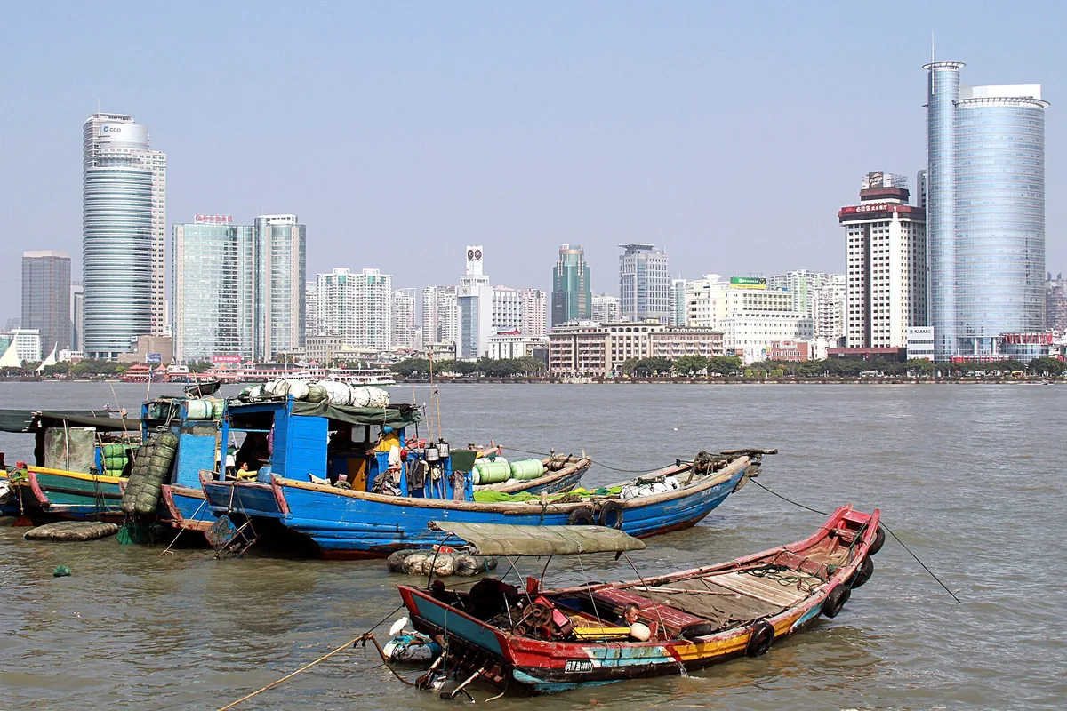 Fishing boats with the Xiamen skyline beyond Gulangyu