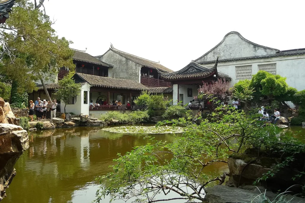 Pond and traditional buildings in a classical Suzhou garden