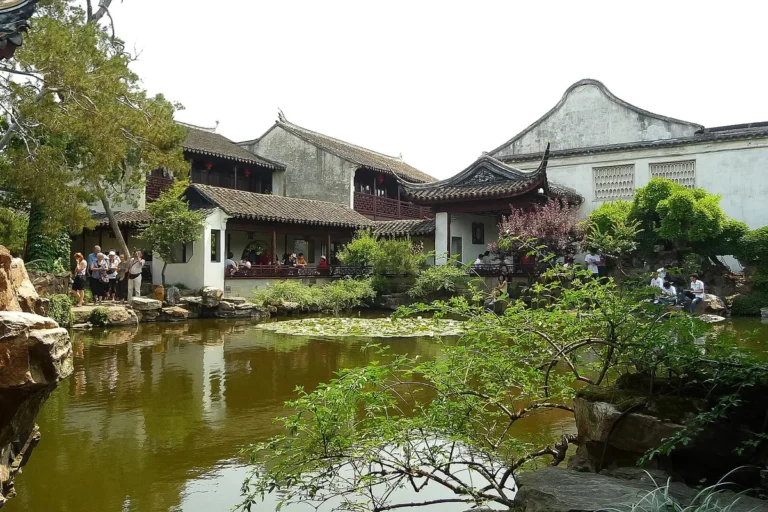 Pond and traditional buildings in a classical Suzhou garden