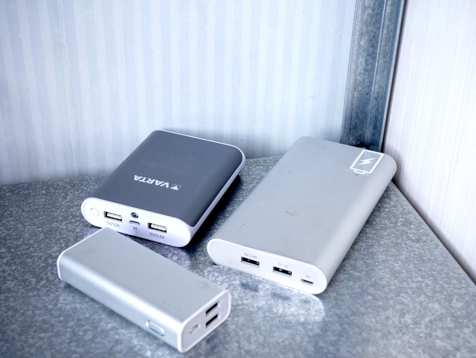 Several portable power banks photographed together
